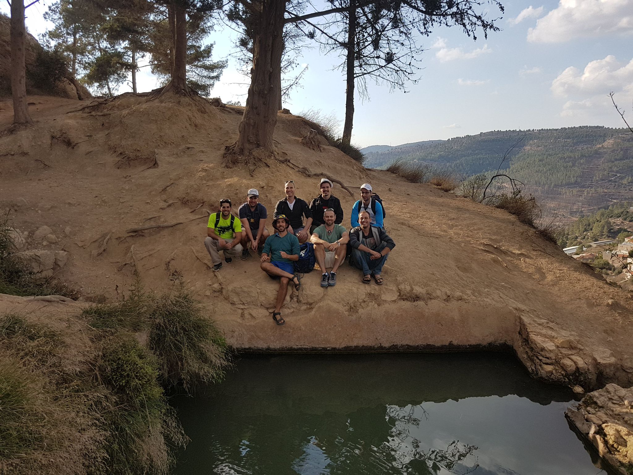 Managers group sitting outdoors during the retreat